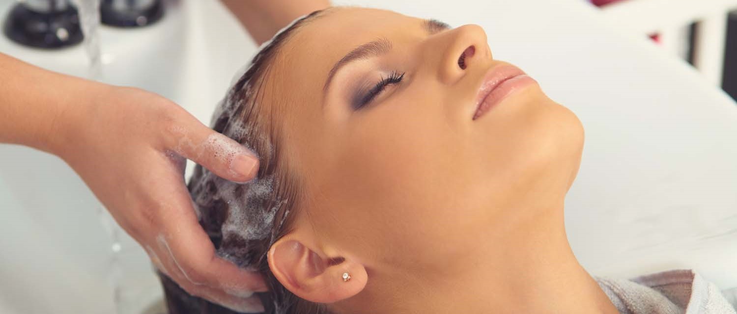 woman having her hair washed